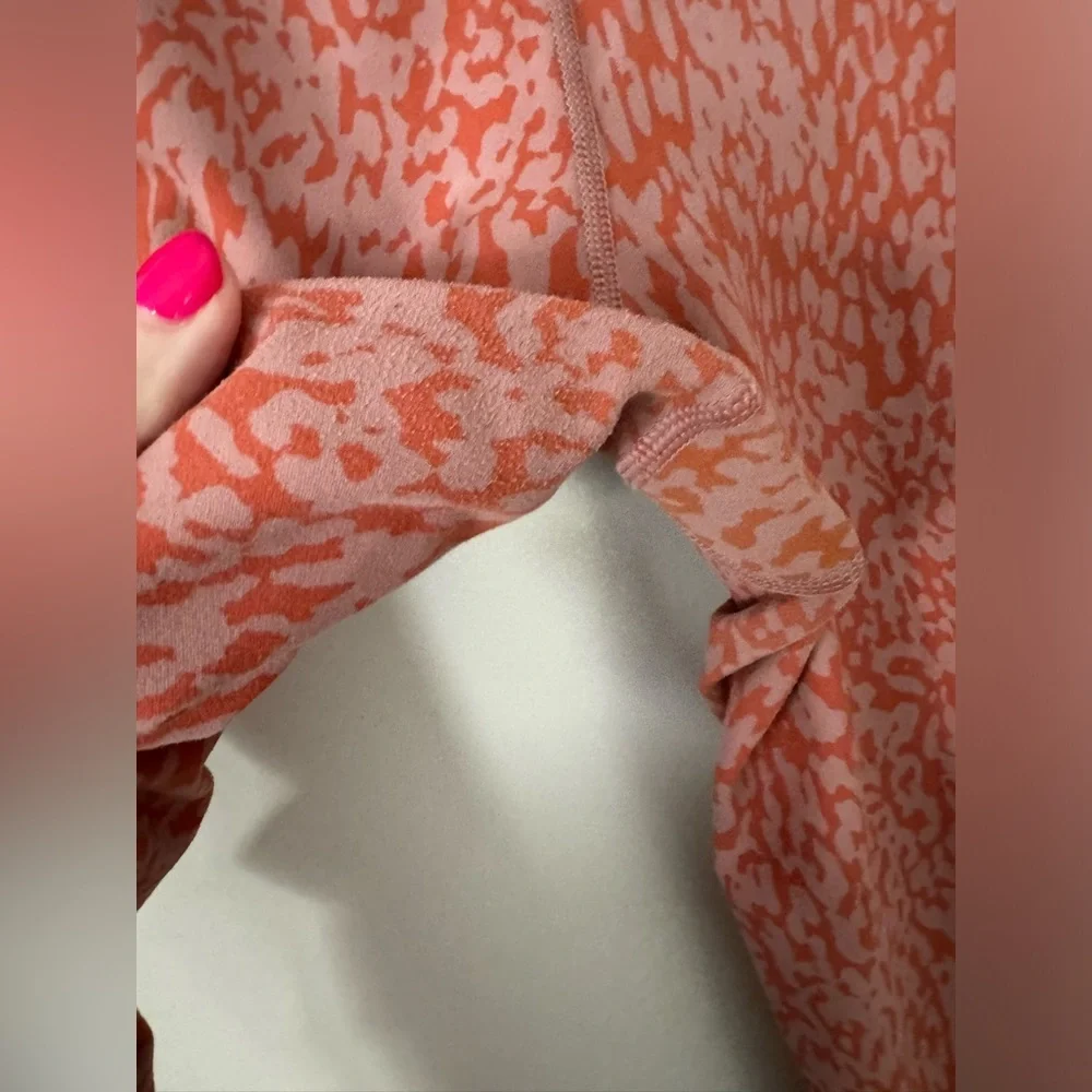 Athleta Salutation Stash Pocket II Printed 7/8 Tight Ocelot Spot Jewel Orange